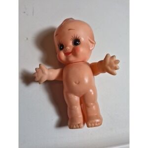 Kewpie doll 4 1/2 inches tall with movable arms stationary legs